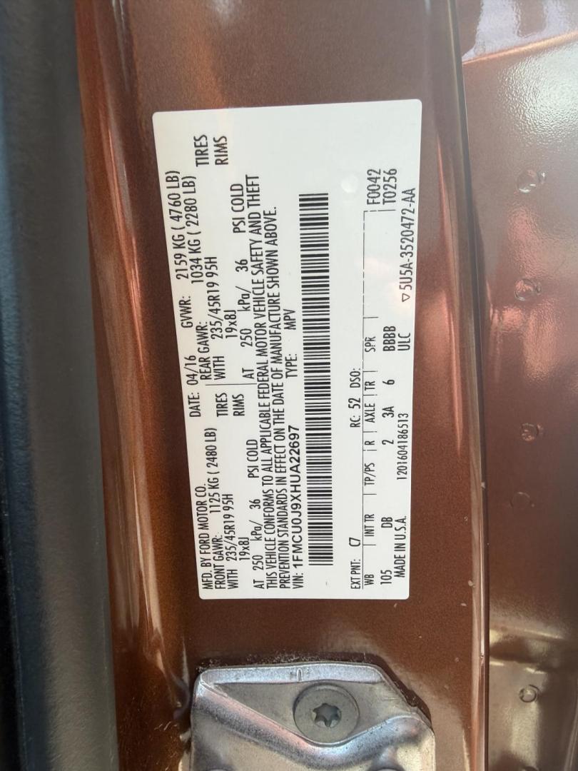 2017 Copper Ford Escape Titanium FWD (1FMCU0J9XHU) with an 2.0L L4 DOHC 16V engine, 6A transmission, located at 1687 Business 35 S, New Braunfels, TX, 78130, (830) 625-7159, 29.655487, -98.051491 - Photo#14