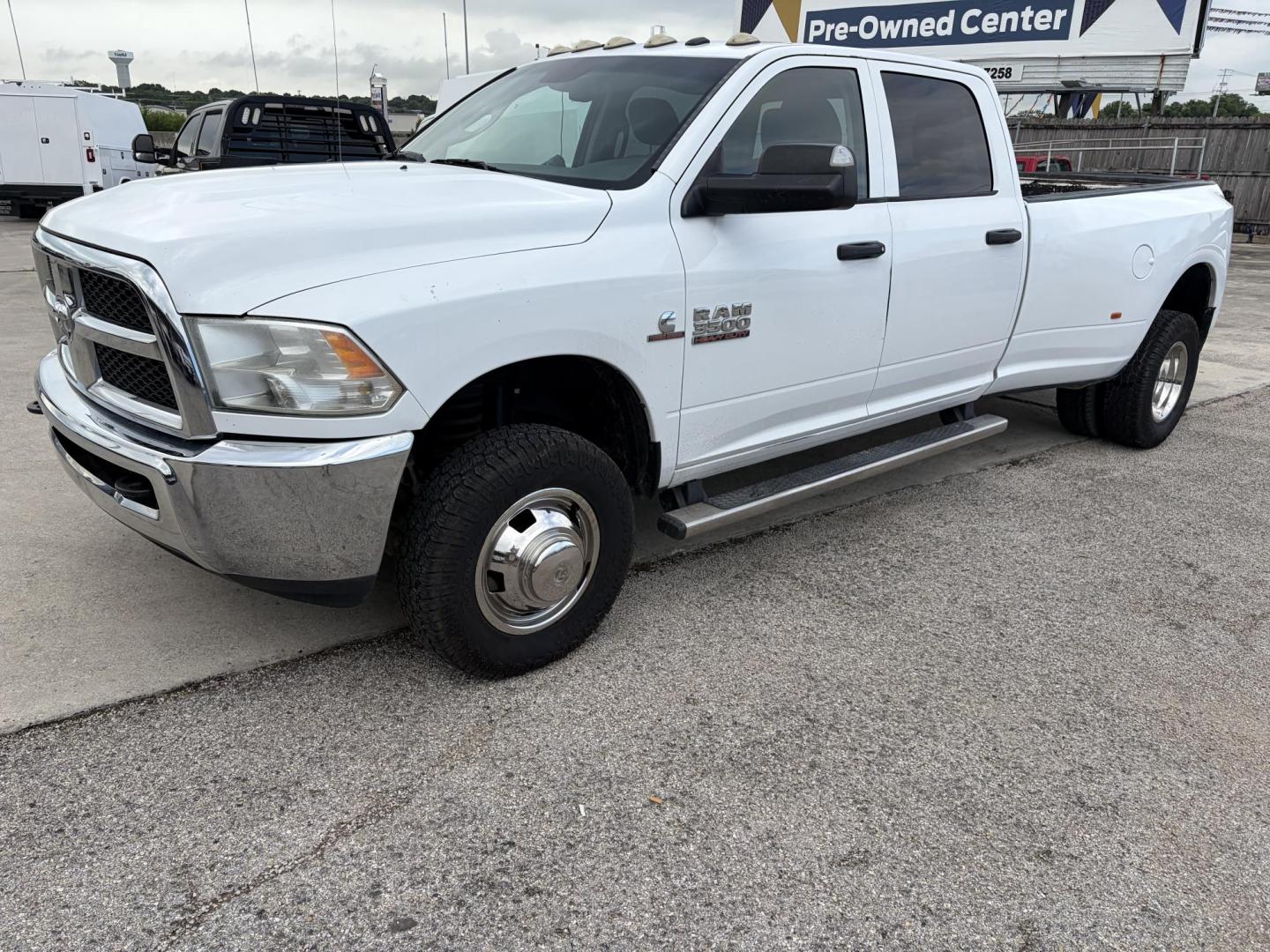2017 White RAM 3500 Tradesman Crew Cab 4WD DRW (3C63RRGL1HG) with an 6.7L L6 OHV 24V TURBO DIESEL engine, 6A transmission, located at 1687 Business 35 S, New Braunfels, TX, 78130, (830) 625-7159, 29.655487, -98.051491 - Photo#0