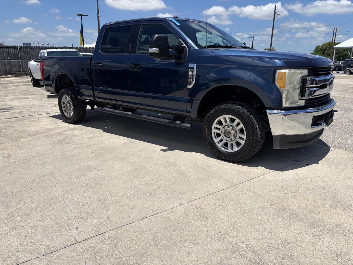 2017 Blue Ford F-250 SD XLT Crew Cab 4WD (1FT7W2B6XHE) with an 6.2L V8 OHV 16V engine, 6A transmission, located at 1687 Business 35 S, New Braunfels, TX, 78130, (830) 625-7159, 29.655487, -98.051491 - Photo#1