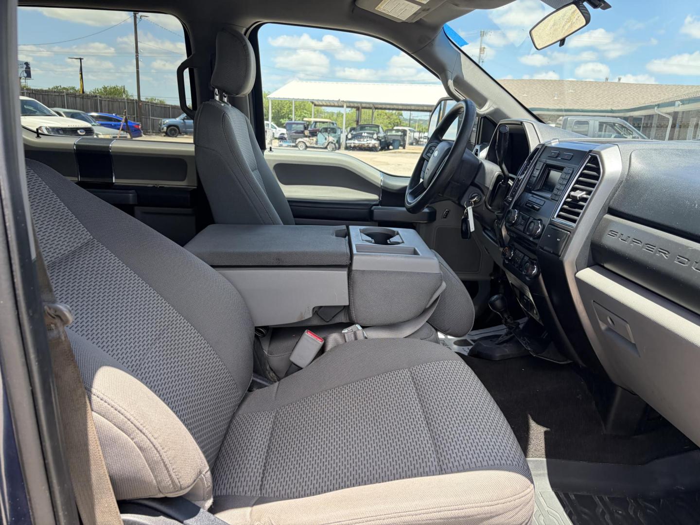 2017 Blue Ford F-250 SD XLT Crew Cab 4WD (1FT7W2B6XHE) with an 6.2L V8 OHV 16V engine, 6A transmission, located at 1687 Business 35 S, New Braunfels, TX, 78130, (830) 625-7159, 29.655487, -98.051491 - Photo#2