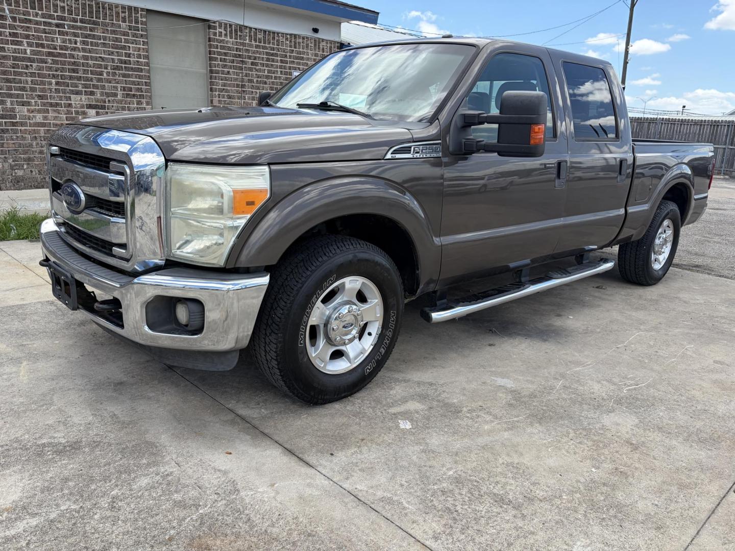 2015 Brown Ford F-250 SD XLT Crew Cab 2WD (1FT7W2A61FE) with an 6.2L V8 OHV 16V engine, 6-Speed Automatic transmission, located at 1687 Business 35 S, New Braunfels, TX, 78130, (830) 625-7159, 29.655487, -98.051491 - Photo#0