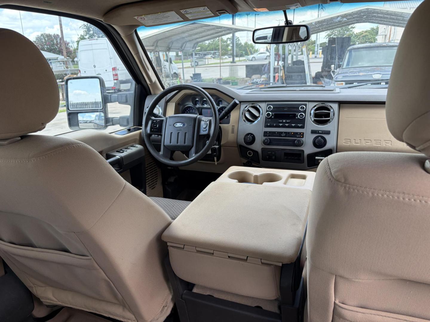 2015 Brown Ford F-250 SD XLT Crew Cab 2WD (1FT7W2A61FE) with an 6.2L V8 OHV 16V engine, 6-Speed Automatic transmission, located at 1687 Business 35 S, New Braunfels, TX, 78130, (830) 625-7159, 29.655487, -98.051491 - Photo#5