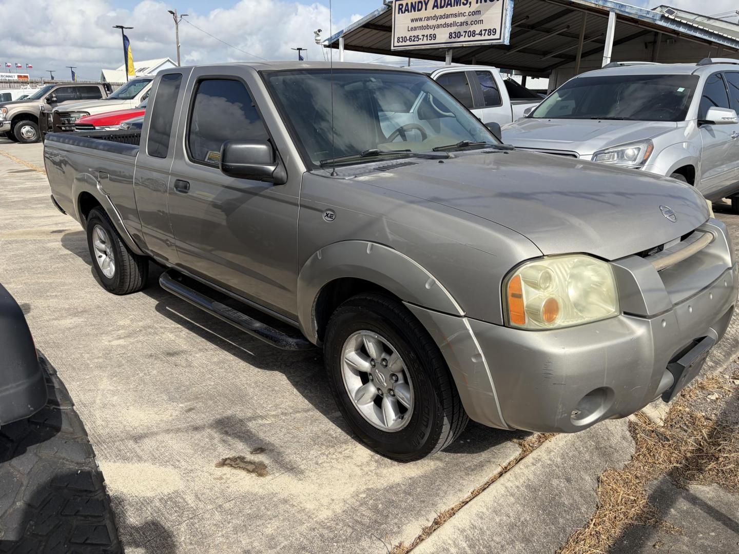 2004 Tan Nissan Frontier King Cab 2WD (1N6DD26T24C) with an 2.4L L4 DOHC 16V engine, 5-Speed Manual Overdrive transmission, located at 1687 Business 35 S, New Braunfels, TX, 78130, (830) 625-7159, 29.655487, -98.051491- Photo#1
