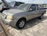 2004 Tan Nissan Frontier King Cab 2WD (1N6DD26T24C) with an 2.4L L4 DOHC 16V engine, 5-Speed Manual Overdrive transmission, located at 1687 Business 35 S, New Braunfels, TX, 78130, (830) 625-7159, 29.655487, -98.051491- Photo#0