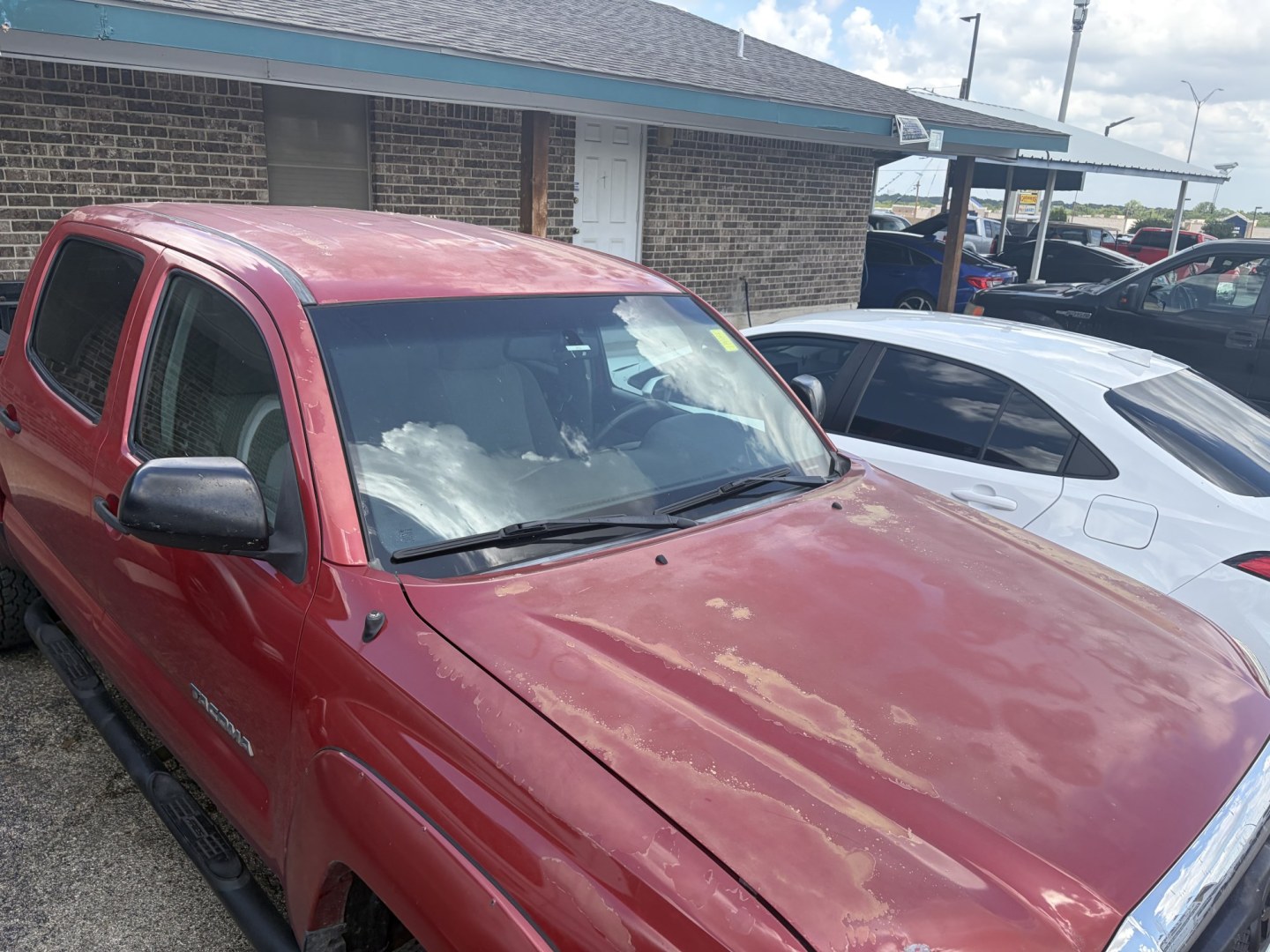 2013 Red Toyota Tacoma PreRunner Double Cab V6 Auto 2WD (3TMJU4GN5DM) with an 4.0L V6 DOHC 24V engine, 5-Speed Automatic transmission, located at 1687 Business 35 S, New Braunfels, TX, 78130, (830) 625-7159, 29.655487, -98.051491- Photo#2