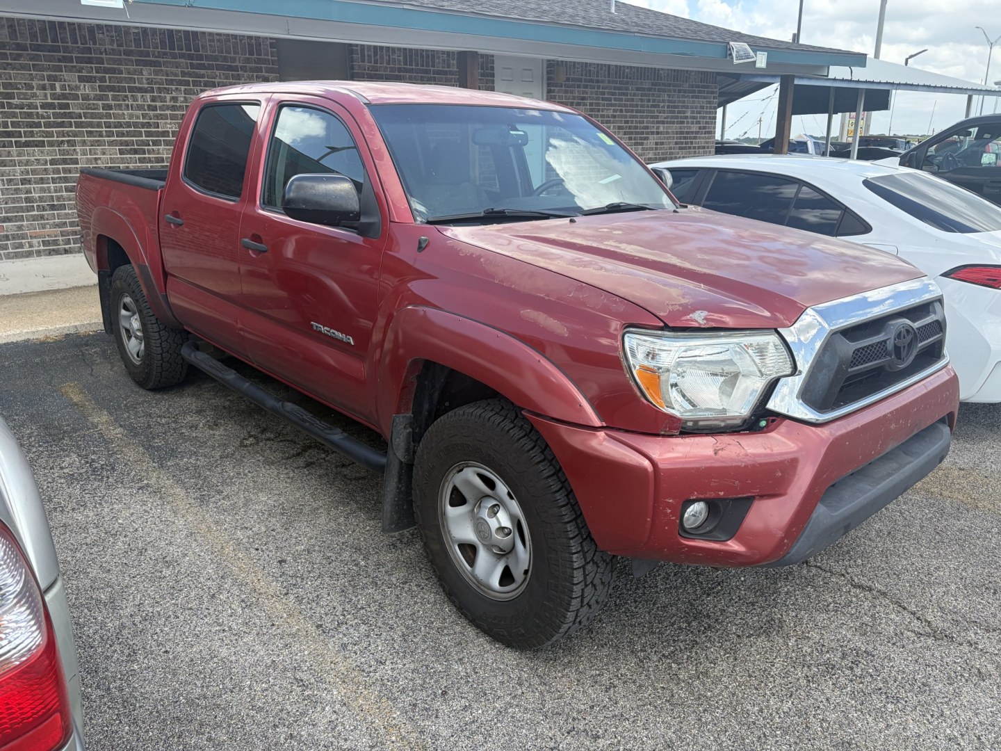 2013 Red Toyota Tacoma PreRunner Double Cab V6 Auto 2WD (3TMJU4GN5DM) with an 4.0L V6 DOHC 24V engine, 5-Speed Automatic transmission, located at 1687 Business 35 S, New Braunfels, TX, 78130, (830) 625-7159, 29.655487, -98.051491- Photo#1