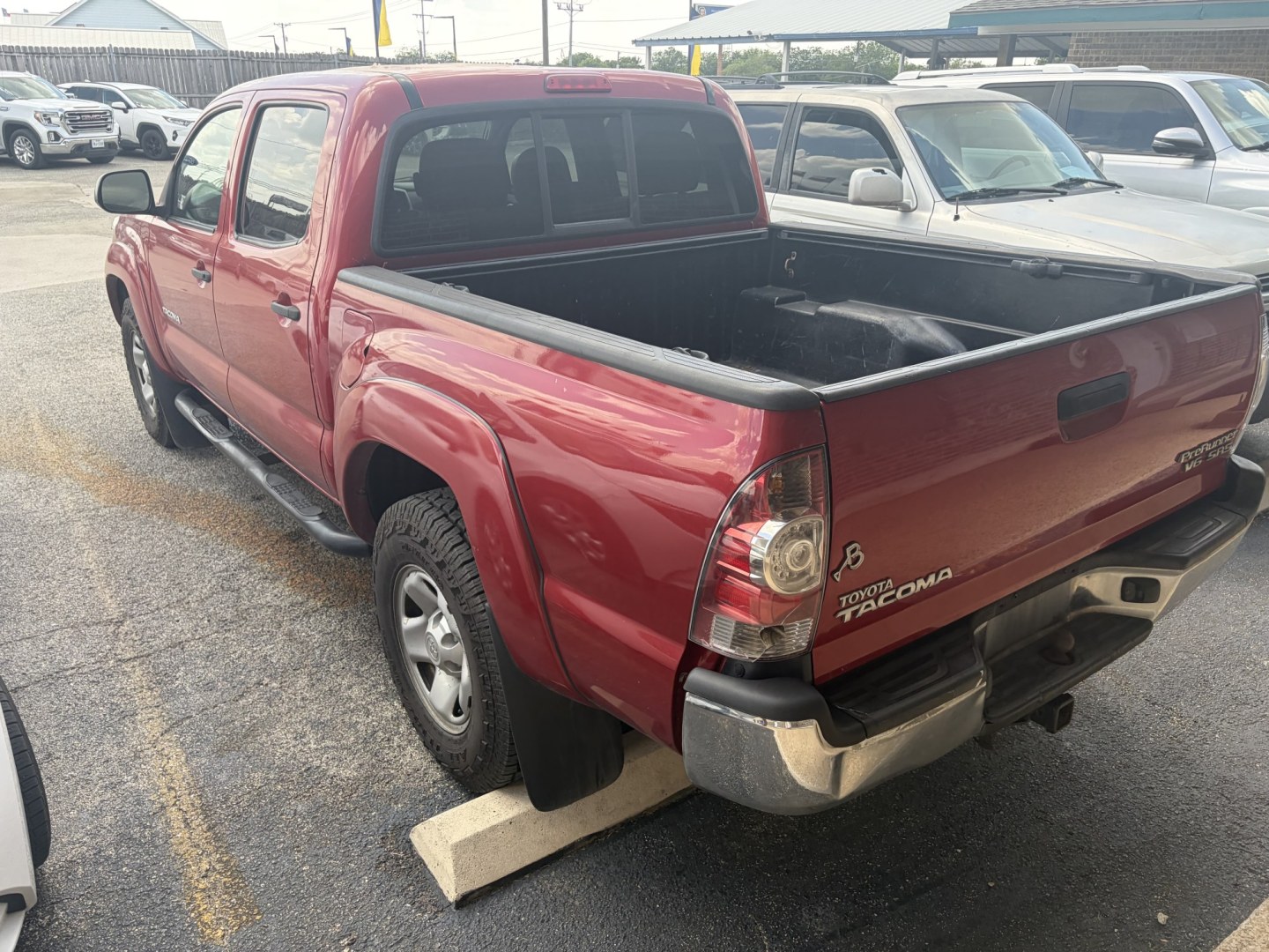 2013 Red Toyota Tacoma PreRunner Double Cab V6 Auto 2WD (3TMJU4GN5DM) with an 4.0L V6 DOHC 24V engine, 5-Speed Automatic transmission, located at 1687 Business 35 S, New Braunfels, TX, 78130, (830) 625-7159, 29.655487, -98.051491- Photo#8