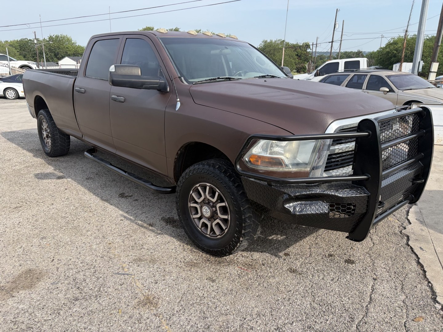 2011 Brown Dodge Ram 2500 SLT Crew Cab 4WD (3D7UT2CL4BG) with an 6.7L L6 OHV 24V TURBO DIESEL engine, located at 1687 Business 35 S, New Braunfels, TX, 78130, (830) 625-7159, 29.655487, -98.051491- Photo#1