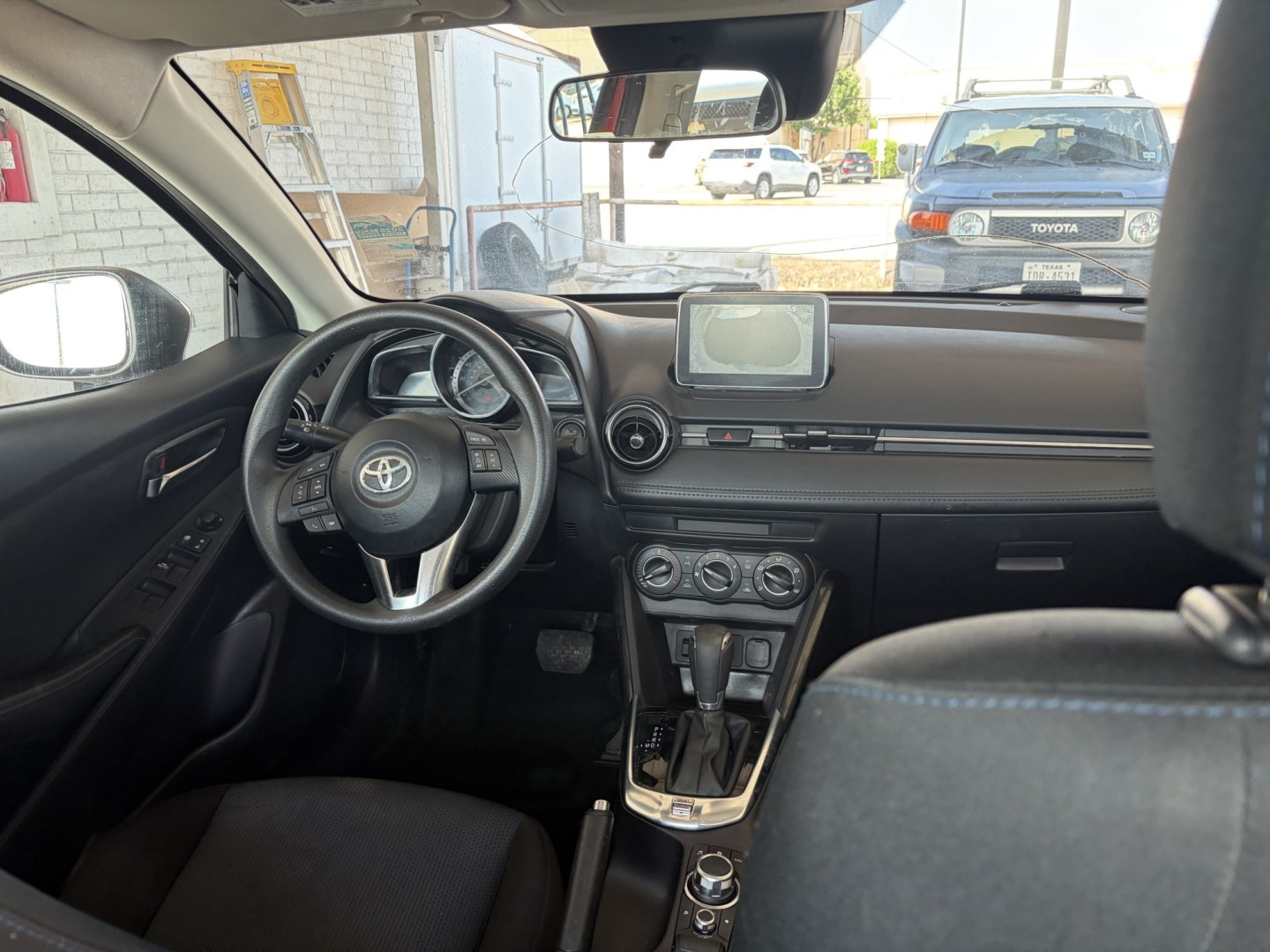 2017 Red Scion Yaris iA iA (3MYDLBYV8HY) with an 1.5L L4 DOHC 16V engine, 6A transmission, located at 1687 Business 35 S, New Braunfels, TX, 78130, (830) 625-7159, 29.655487, -98.051491- Photo#6