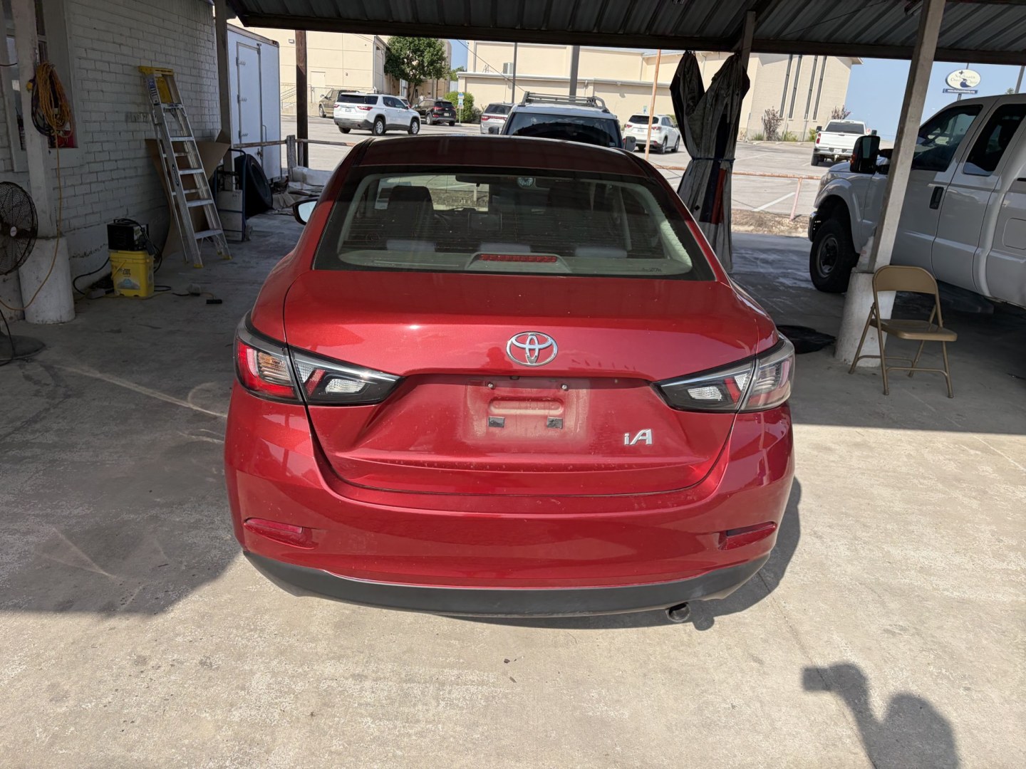 2017 Red Scion Yaris iA iA (3MYDLBYV8HY) with an 1.5L L4 DOHC 16V engine, 6A transmission, located at 1687 Business 35 S, New Braunfels, TX, 78130, (830) 625-7159, 29.655487, -98.051491- Photo#8