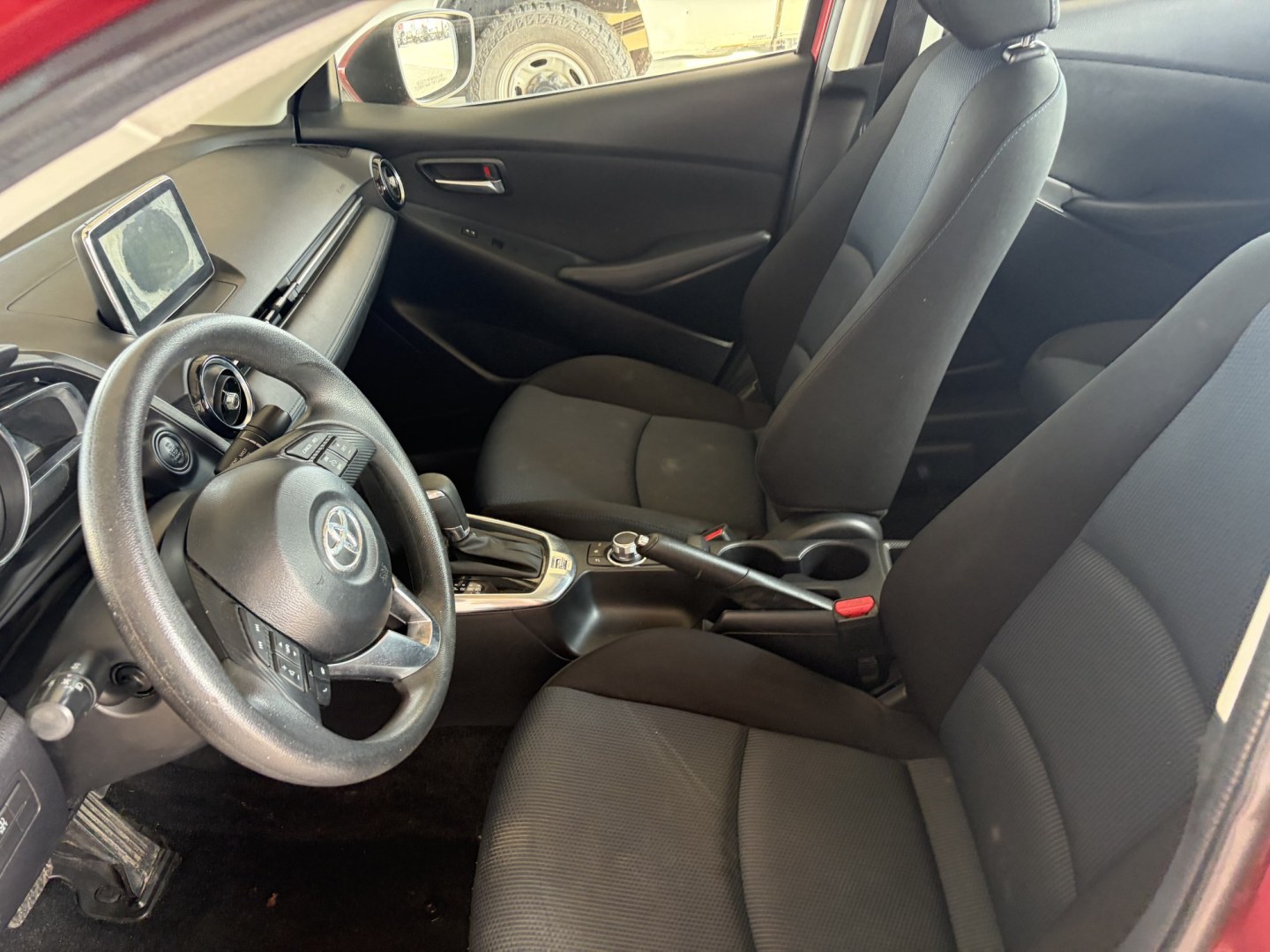 2017 Red Scion Yaris iA iA (3MYDLBYV8HY) with an 1.5L L4 DOHC 16V engine, 6A transmission, located at 1687 Business 35 S, New Braunfels, TX, 78130, (830) 625-7159, 29.655487, -98.051491- Photo#12