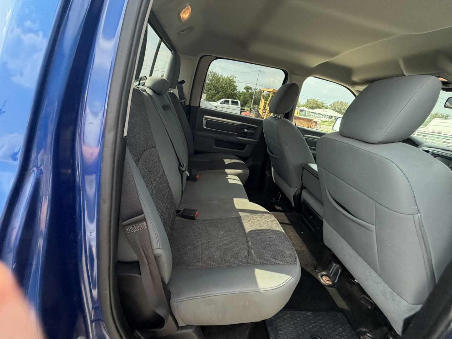 2015 Blue RAM 1500 SLT Crew Cab SWB 4WD (1C6RR7LT5FS) with an 5.7L V8 OHV 16V engine, 6-Speed Automatic transmission, located at 1687 Business 35 S, New Braunfels, TX, 78130, (830) 625-7159, 29.655487, -98.051491- Photo#4