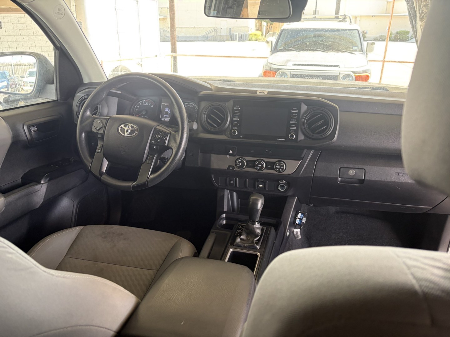 2021 White Toyota Tacoma SR5 Access Cab I4 6AT 2WD (3TYRX5GN5MT) with an 2.7L L4 DOHC 16V engine, 6A transmission, located at 1687 Business 35 S, New Braunfels, TX, 78130, (830) 625-7159, 29.655487, -98.051491- Photo#12