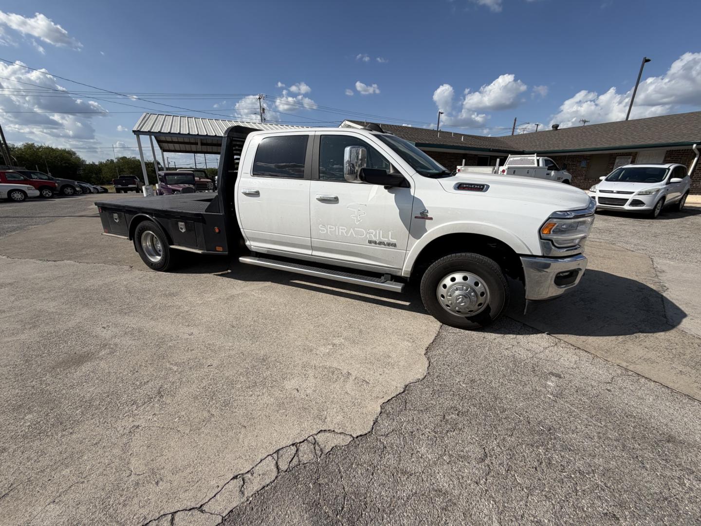 2019 White RAM 3500 Crew Cab Laramie 4WD DRW (3C7WRTCL4KG) with an 6.7L L6 OHV 24V TURBO DIESEL engine, 6A transmission, located at 1687 Business 35 S, New Braunfels, TX, 78130, (830) 625-7159, 29.655487, -98.051491- Photo#1