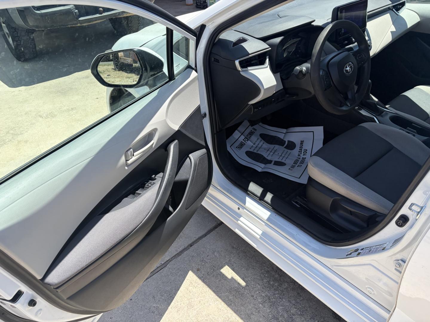 2023 White Toyota Corolla LE (5YFB4MDE6PP) with an 2.0L L4 DOHC 16V engine, CVT transmission, located at 1687 Business 35 S, New Braunfels, TX, 78130, (830) 625-7159, 29.655487, -98.051491- Photo#9