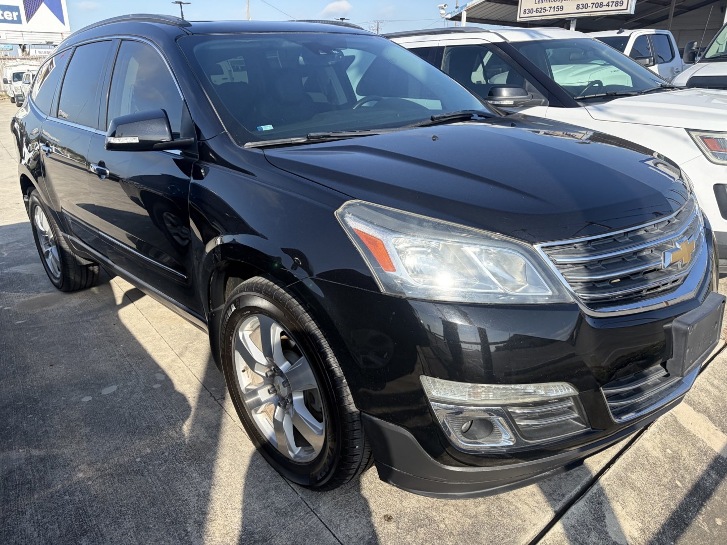 2016 Black Chevrolet Traverse LTZ FWD (1GNKRJKD4GJ) with an 3.6L V6 DOHC 24V engine, 6A transmission, located at 1687 Business 35 S, New Braunfels, TX, 78130, (830) 625-7159, 29.655487, -98.051491- Photo#1