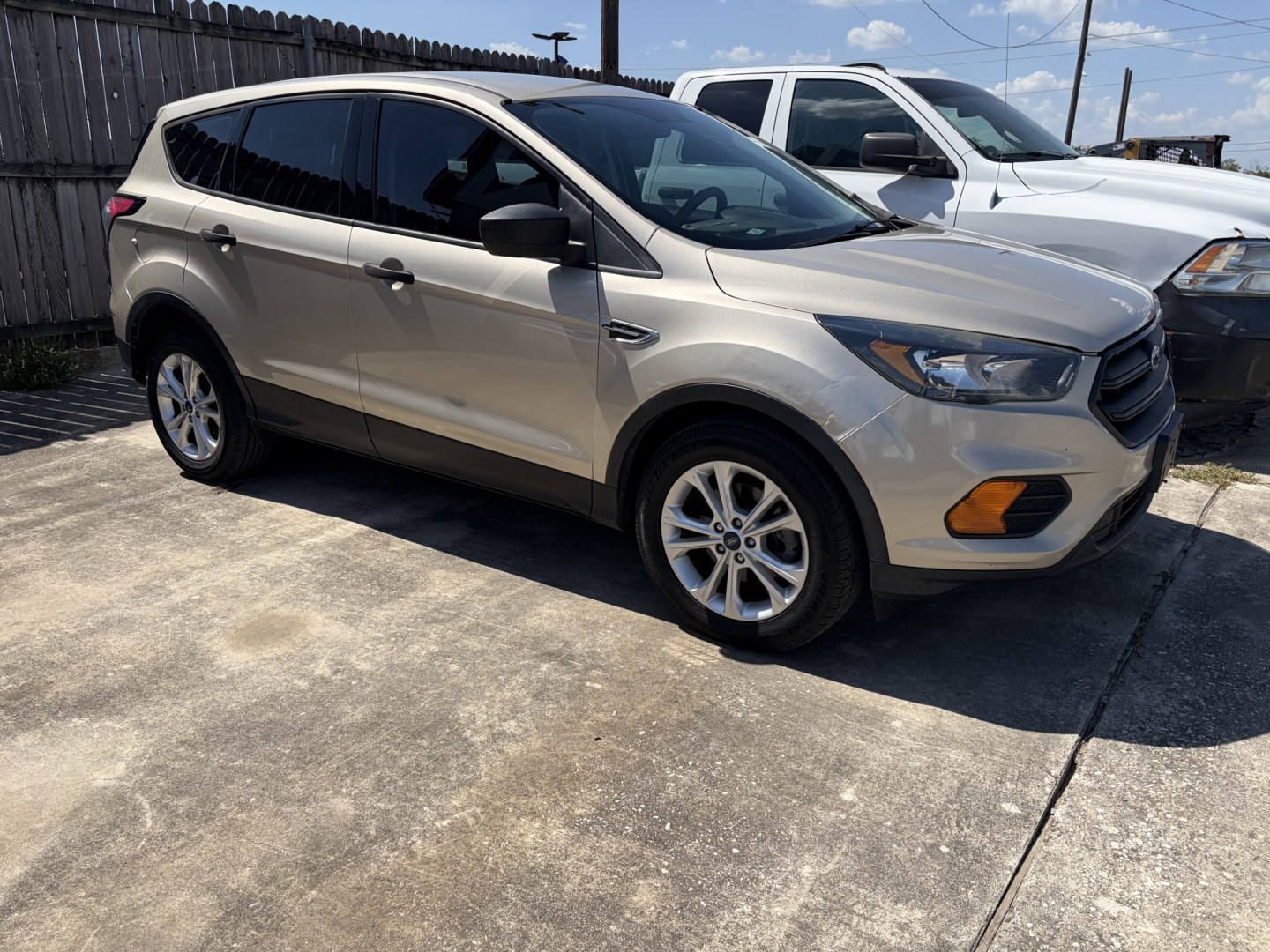 2018 Gold Ford Escape S FWD (1FMCU0F78JU) with an 2.5L L4 DOHC 16V engine, 6A transmission, located at 1687 Business 35 S, New Braunfels, TX, 78130, (830) 625-7159, 29.655487, -98.051491- Photo#1