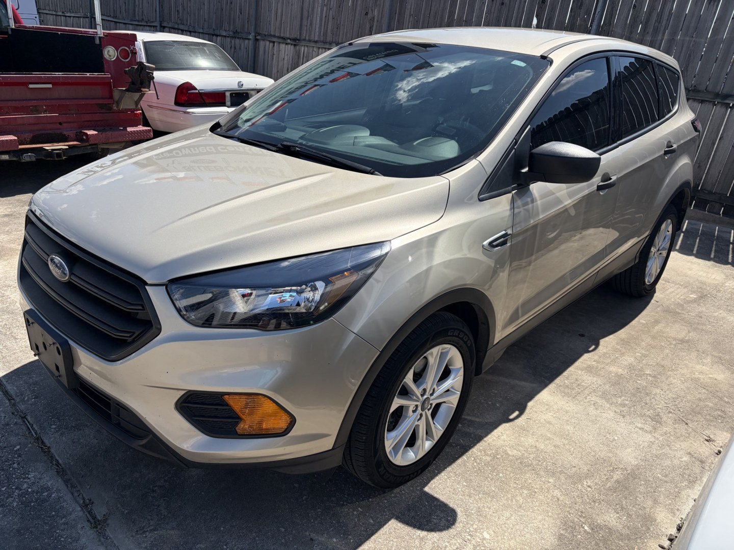 2018 Gold Ford Escape S FWD (1FMCU0F78JU) with an 2.5L L4 DOHC 16V engine, 6A transmission, located at 1687 Business 35 S, New Braunfels, TX, 78130, (830) 625-7159, 29.655487, -98.051491- Photo#0