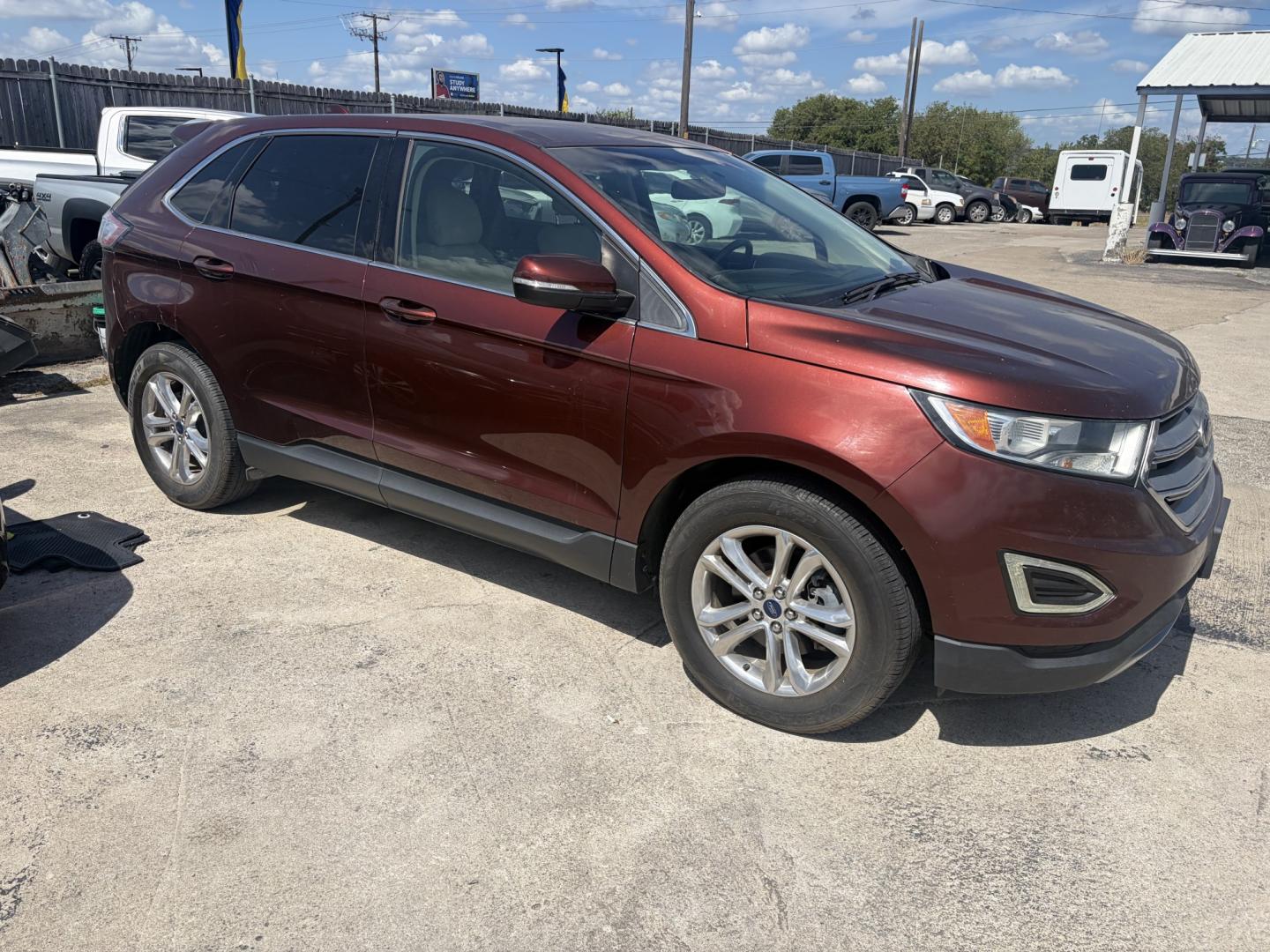 2016 Red Ford Edge SEL FWD (2FMPK3J83GB) with an 3.5L V6 DOHC 24V engine, 6A transmission, located at 1687 Business 35 S, New Braunfels, TX, 78130, (830) 625-7159, 29.655487, -98.051491- Photo#1