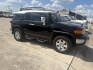 2007 Black Toyota FJ Cruiser 4WD AT (JTEBU11F870) with an 3.4L V6 DOHC 24V engine, 5A OD transmission, located at 1687 Business 35 S, New Braunfels, TX, 78130, (830) 625-7159, 29.655487, -98.051491- Photo#1