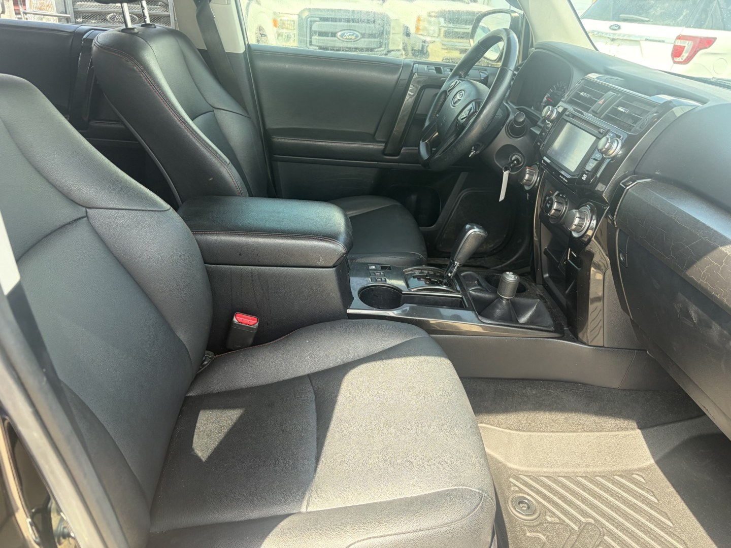 2016 Black Toyota 4Runner TRAIL EDITION SR5 4WD (JTEBU5JRXG5) with an 4.0L V6 DOHC 24V engine, 5A transmission, located at 1687 Business 35 S, New Braunfels, TX, 78130, (830) 625-7159, 29.655487, -98.051491- Photo#2
