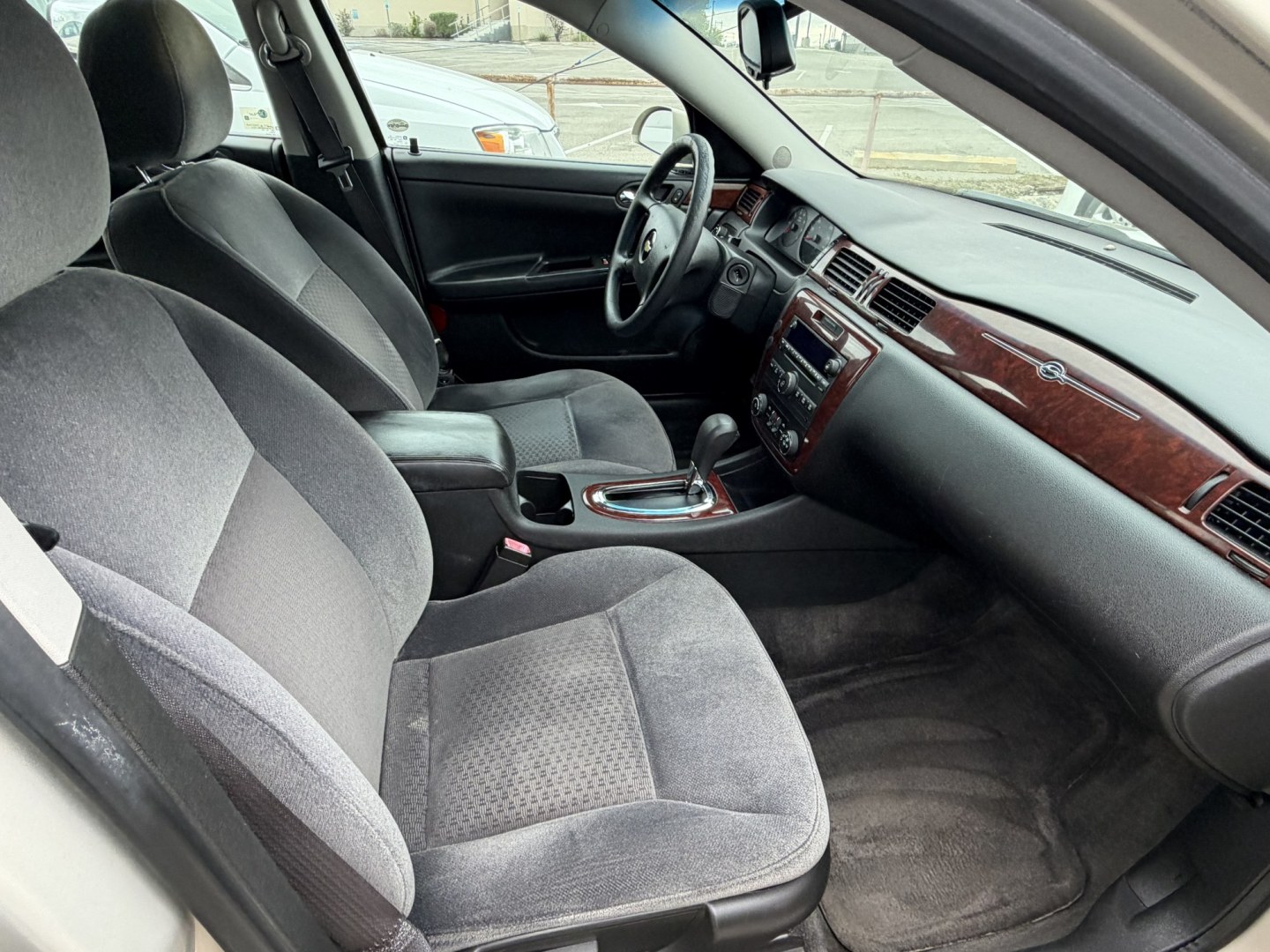 2009 Tan Chevrolet Impala LS (2G1WB57K891) with an 3.5L V6 OHV 16V FFV engine, 4A transmission, located at 1687 Business 35 S, New Braunfels, TX, 78130, (830) 625-7159, 29.655487, -98.051491- Photo#2