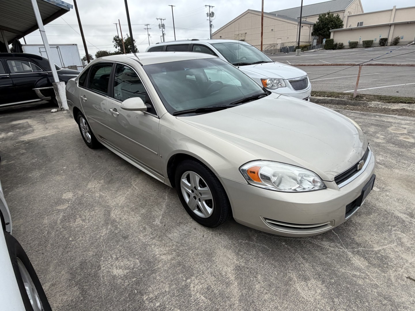2009 Tan Chevrolet Impala LS (2G1WB57K891) with an 3.5L V6 OHV 16V FFV engine, 4A transmission, located at 1687 Business 35 S, New Braunfels, TX, 78130, (830) 625-7159, 29.655487, -98.051491- Photo#1
