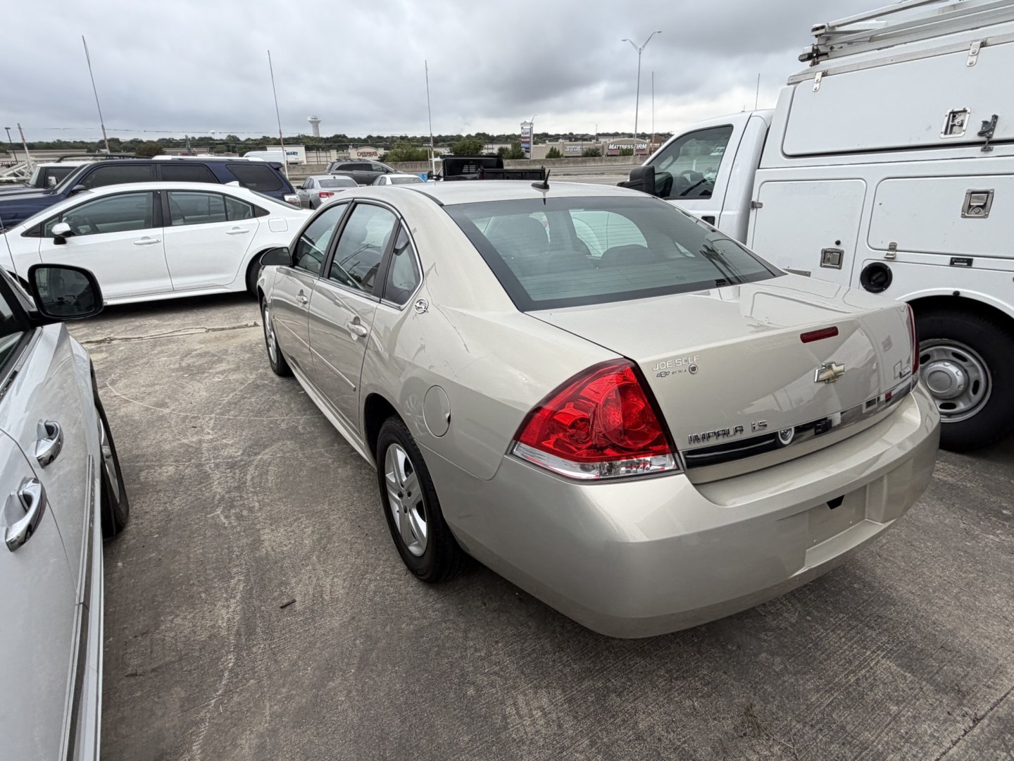 2009 Tan Chevrolet Impala LS (2G1WB57K891) with an 3.5L V6 OHV 16V FFV engine, 4A transmission, located at 1687 Business 35 S, New Braunfels, TX, 78130, (830) 625-7159, 29.655487, -98.051491- Photo#7