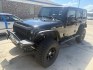 2014 Black Jeep Wrangler Unlimited Sport 4WD (1C4BJWDG5EL) with an 3.6L V6 DOHC 24V FFV engine, located at 1687 Business 35 S, New Braunfels, TX, 78130, (830) 625-7159, 29.655487, -98.051491- Photo#0