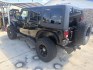 2014 Black Jeep Wrangler Unlimited Sport 4WD (1C4BJWDG5EL) with an 3.6L V6 DOHC 24V FFV engine, located at 1687 Business 35 S, New Braunfels, TX, 78130, (830) 625-7159, 29.655487, -98.051491- Photo#7
