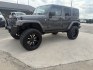 2014 gray Jeep Wrangler Unlimited Rubicon 4WD (1C4BJWFG7EL) with an 3.6L V6 DOHC 24V FFV engine, located at 1687 Business 35 S, New Braunfels, TX, 78130, (830) 625-7159, 29.655487, -98.051491- Photo#0