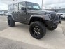 2014 gray Jeep Wrangler Unlimited Rubicon 4WD (1C4BJWFG7EL) with an 3.6L V6 DOHC 24V FFV engine, located at 1687 Business 35 S, New Braunfels, TX, 78130, (830) 625-7159, 29.655487, -98.051491- Photo#1