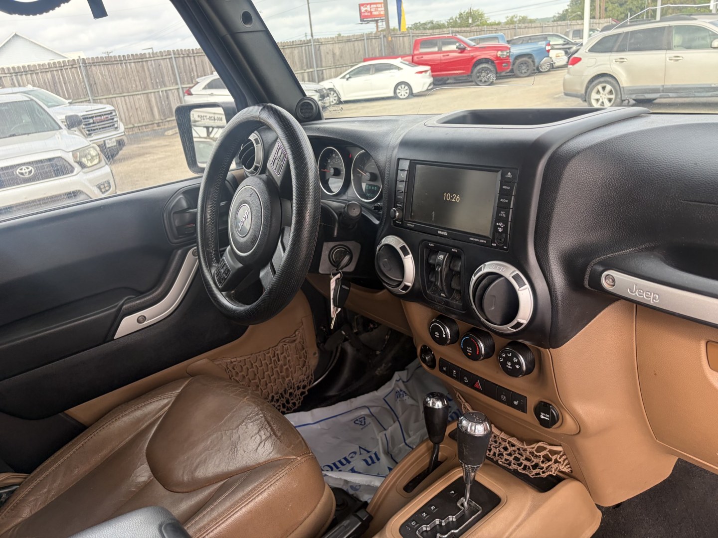 2014 gray Jeep Wrangler Unlimited Rubicon 4WD (1C4BJWFG7EL) with an 3.6L V6 DOHC 24V FFV engine, located at 1687 Business 35 S, New Braunfels, TX, 78130, (830) 625-7159, 29.655487, -98.051491- Photo#3