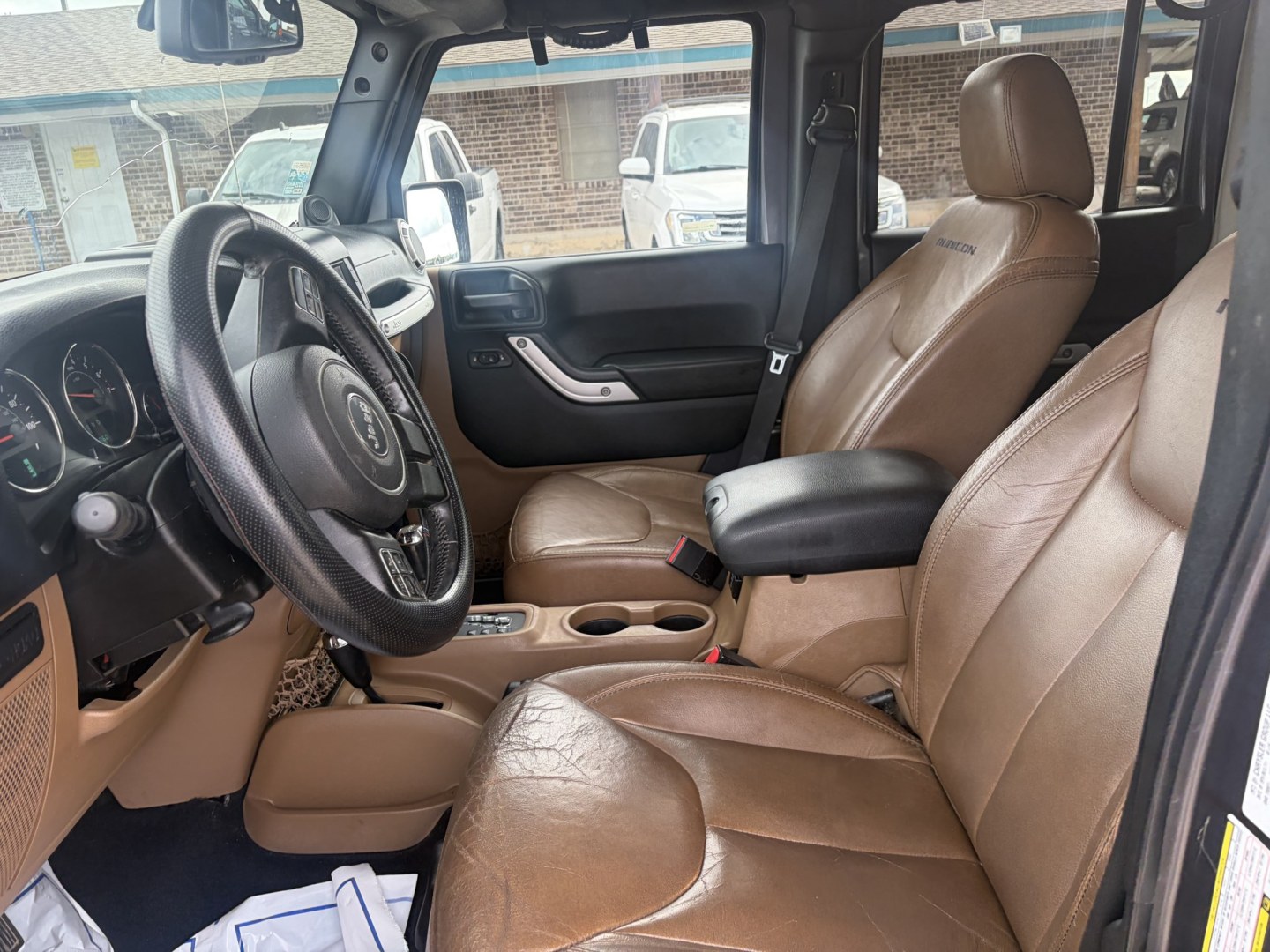 2014 gray Jeep Wrangler Unlimited Rubicon 4WD (1C4BJWFG7EL) with an 3.6L V6 DOHC 24V FFV engine, located at 1687 Business 35 S, New Braunfels, TX, 78130, (830) 625-7159, 29.655487, -98.051491- Photo#10