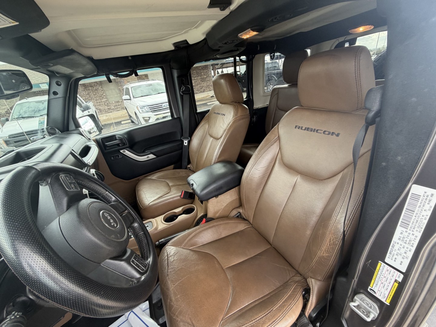 2014 gray Jeep Wrangler Unlimited Rubicon 4WD (1C4BJWFG7EL) with an 3.6L V6 DOHC 24V FFV engine, located at 1687 Business 35 S, New Braunfels, TX, 78130, (830) 625-7159, 29.655487, -98.051491- Photo#13