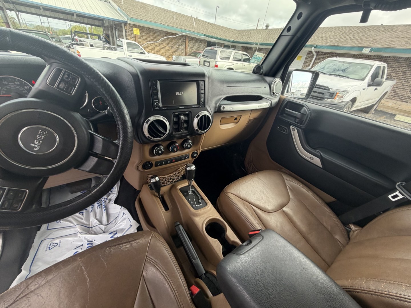2014 gray Jeep Wrangler Unlimited Rubicon 4WD (1C4BJWFG7EL) with an 3.6L V6 DOHC 24V FFV engine, located at 1687 Business 35 S, New Braunfels, TX, 78130, (830) 625-7159, 29.655487, -98.051491- Photo#12