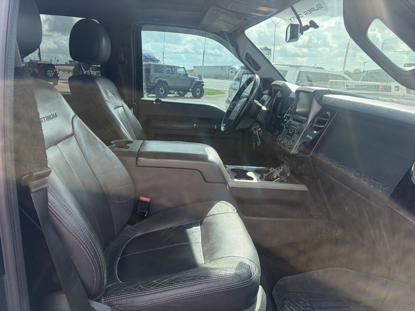 2015 Black Ford F-250 SD Lariat Crew Cab 4WD (1FT7W2BT9FE) with an 6.7L V8 OHV 16V DIESEL engine, 6-Speed Automatic transmission, located at 1687 Business 35 S, New Braunfels, TX, 78130, (830) 625-7159, 29.655487, -98.051491- Photo#2