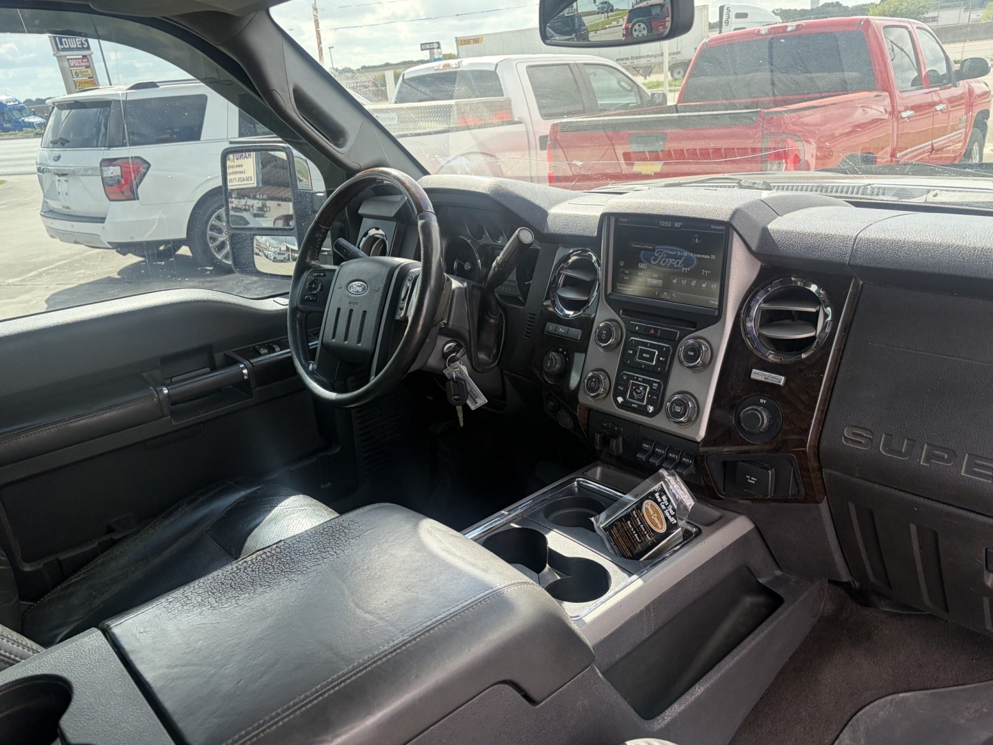 2015 Black Ford F-250 SD Lariat Crew Cab 4WD (1FT7W2BT9FE) with an 6.7L V8 OHV 16V DIESEL engine, 6-Speed Automatic transmission, located at 1687 Business 35 S, New Braunfels, TX, 78130, (830) 625-7159, 29.655487, -98.051491- Photo#3