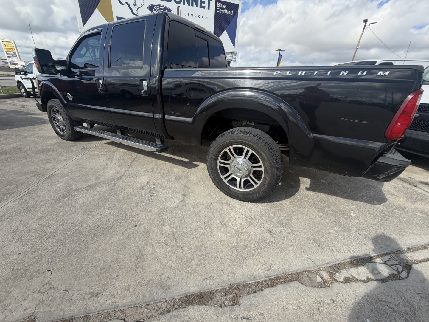 2015 Black Ford F-250 SD Lariat Crew Cab 4WD (1FT7W2BT9FE) with an 6.7L V8 OHV 16V DIESEL engine, 6-Speed Automatic transmission, located at 1687 Business 35 S, New Braunfels, TX, 78130, (830) 625-7159, 29.655487, -98.051491- Photo#8