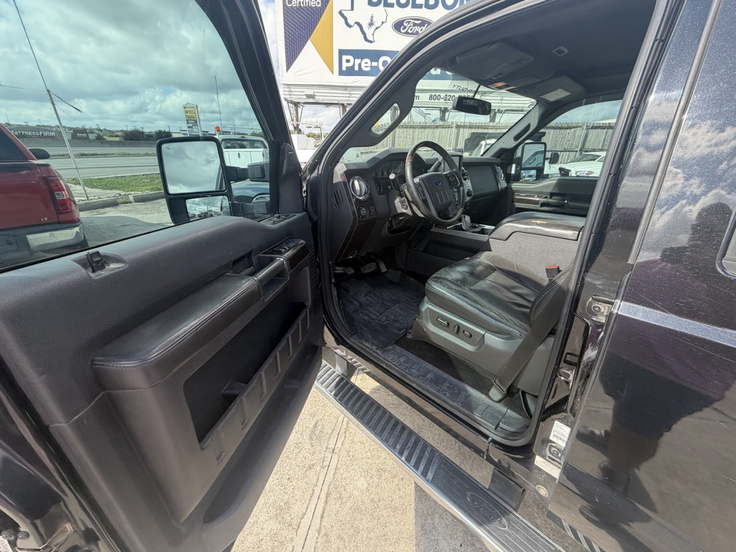 2015 Black Ford F-250 SD Lariat Crew Cab 4WD (1FT7W2BT9FE) with an 6.7L V8 OHV 16V DIESEL engine, 6-Speed Automatic transmission, located at 1687 Business 35 S, New Braunfels, TX, 78130, (830) 625-7159, 29.655487, -98.051491- Photo#10