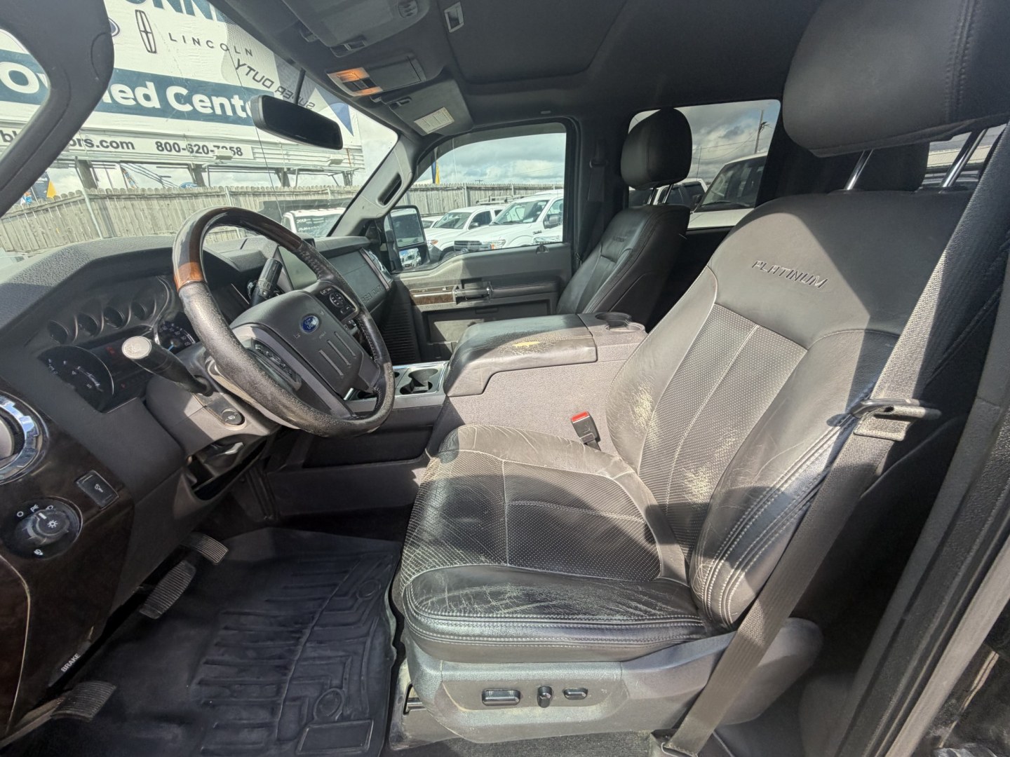 2015 Black Ford F-250 SD Lariat Crew Cab 4WD (1FT7W2BT9FE) with an 6.7L V8 OHV 16V DIESEL engine, 6-Speed Automatic transmission, located at 1687 Business 35 S, New Braunfels, TX, 78130, (830) 625-7159, 29.655487, -98.051491- Photo#11