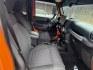 2012 Orange Jeep Wrangler Unlimited Sport 4WD (1C4BJWDGXCL) with an 3.6L V6 DOHC 24V FFV engine, located at 1687 Business 35 S, New Braunfels, TX, 78130, (830) 625-7159, 29.655487, -98.051491- Photo#2