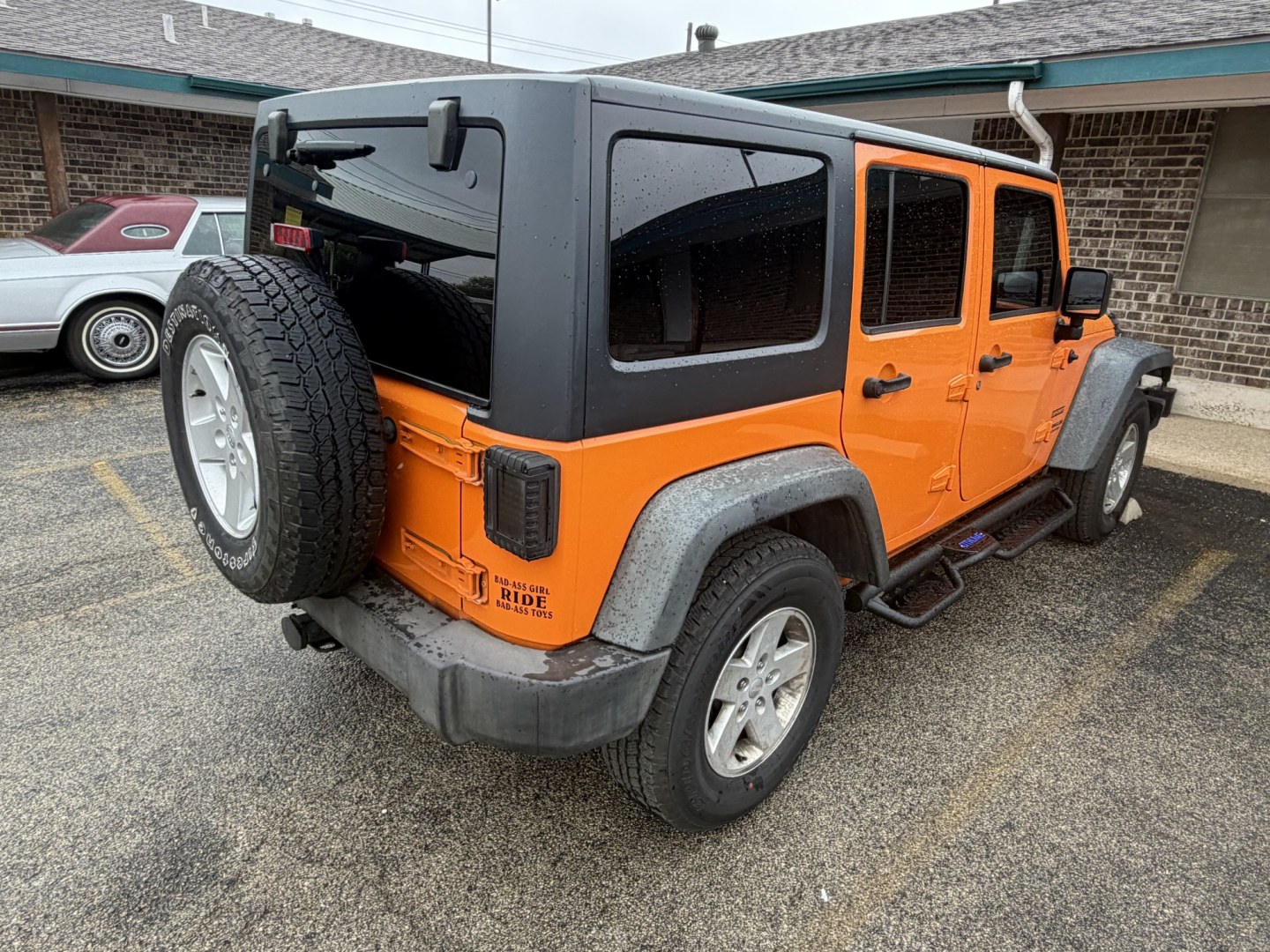 2012 Orange Jeep Wrangler Unlimited Sport 4WD (1C4BJWDGXCL) with an 3.6L V6 DOHC 24V FFV engine, located at 1687 Business 35 S, New Braunfels, TX, 78130, (830) 625-7159, 29.655487, -98.051491- Photo#6