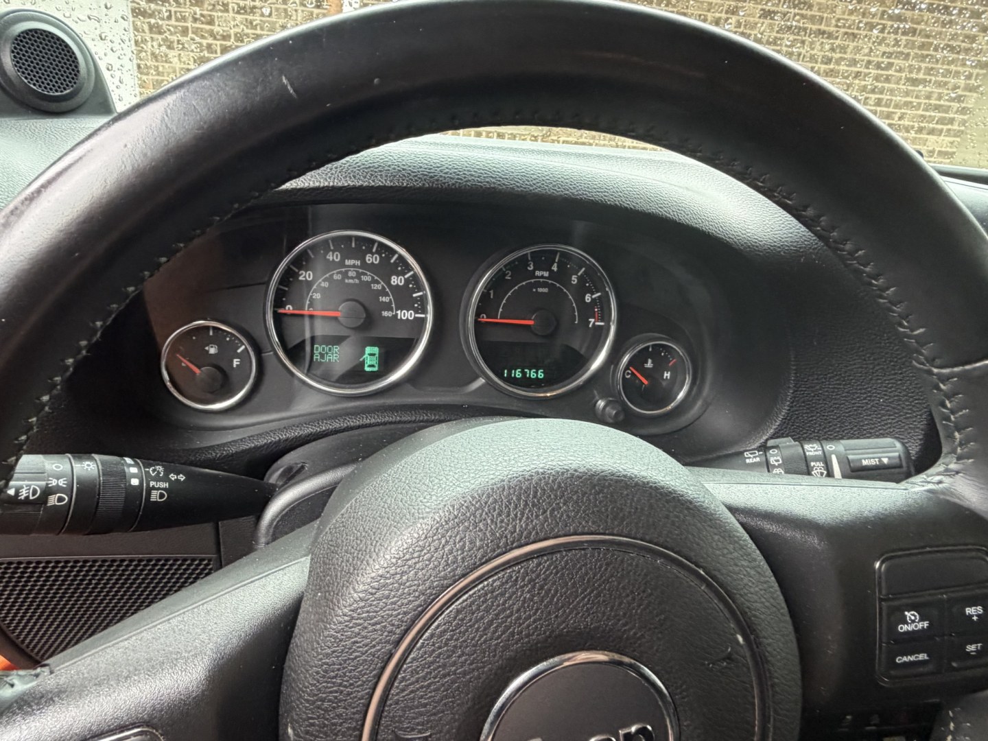2012 Orange Jeep Wrangler Unlimited Sport 4WD (1C4BJWDGXCL) with an 3.6L V6 DOHC 24V FFV engine, located at 1687 Business 35 S, New Braunfels, TX, 78130, (830) 625-7159, 29.655487, -98.051491- Photo#12