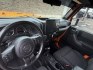 2012 Orange Jeep Wrangler Unlimited Sport 4WD (1C4BJWDGXCL) with an 3.6L V6 DOHC 24V FFV engine, located at 1687 Business 35 S, New Braunfels, TX, 78130, (830) 625-7159, 29.655487, -98.051491- Photo#11