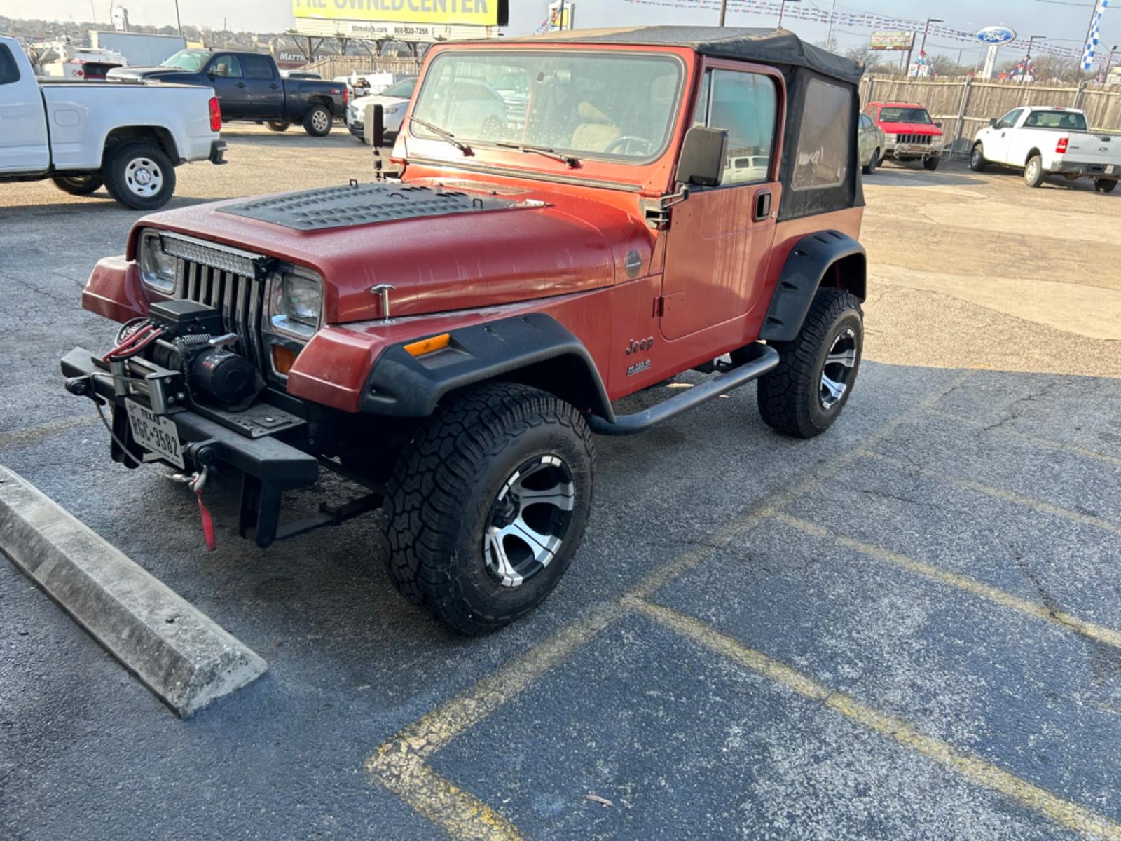 1987 Orange AMC Wrangler Sport (2BCCE81K6HB) with an 350 V8 Chevrolet engine, 4-Speed Automatic transmission, located at 1687 Business 35 S, New Braunfels, TX, 78130, (830) 625-7159, 29.655487, -98.051491 - Photo #0