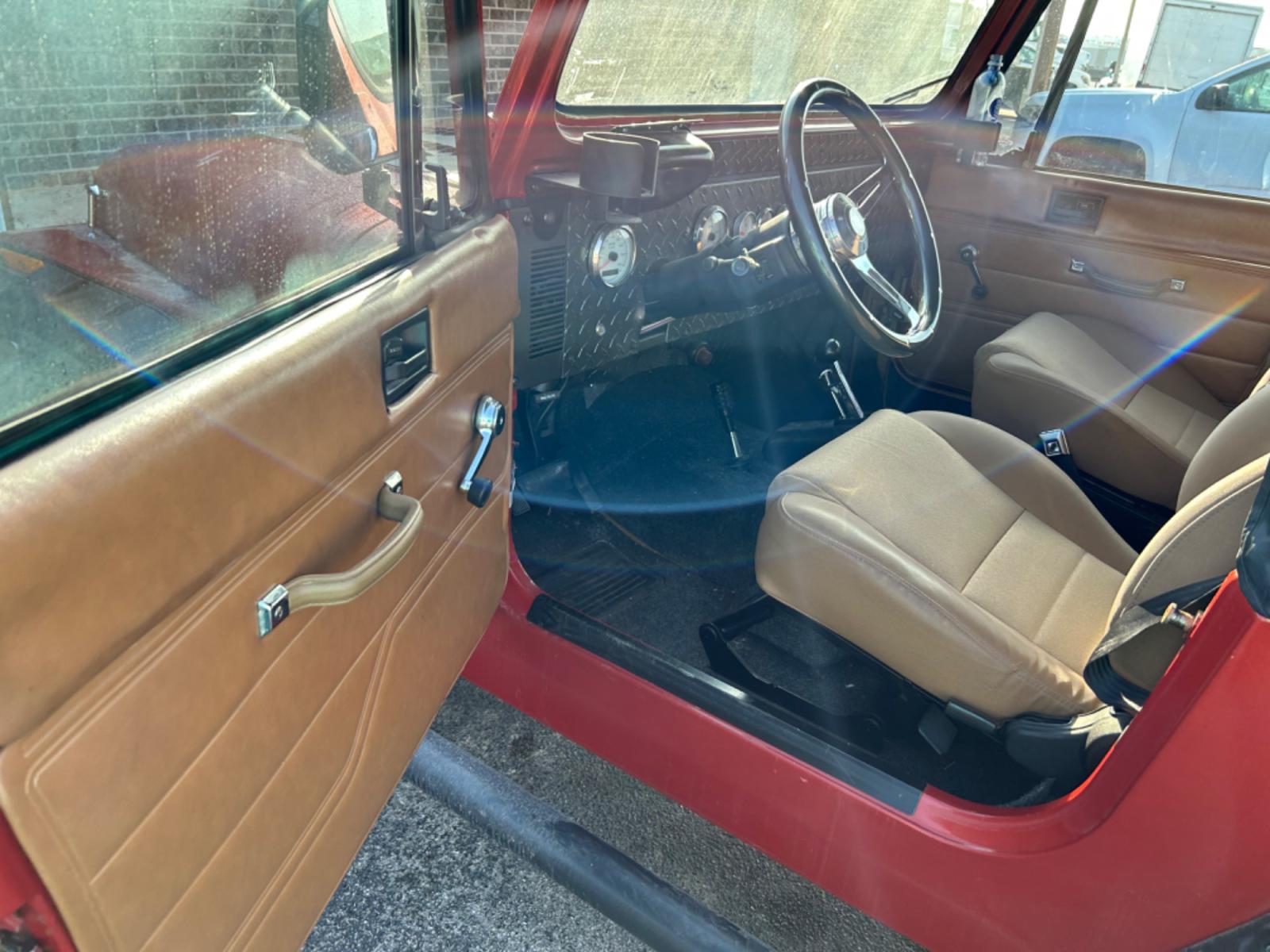 1987 Orange AMC Wrangler Sport (2BCCE81K6HB) with an 350 V8 Chevrolet engine, 4-Speed Automatic transmission, located at 1687 Business 35 S, New Braunfels, TX, 78130, (830) 625-7159, 29.655487, -98.051491 - Photo #4