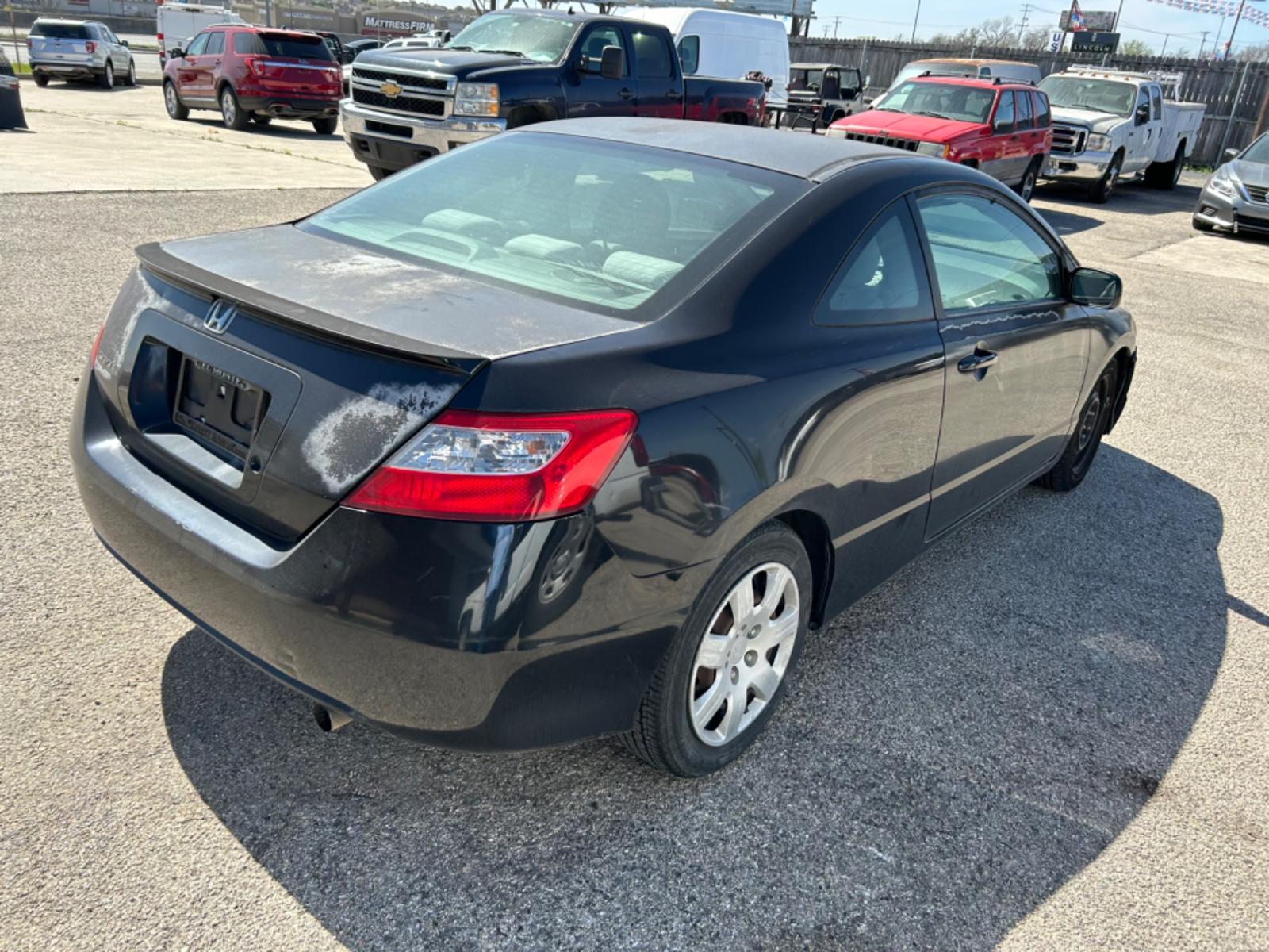 2007 Black Honda Accord LX Coupe AT (2HGFG12677H) with an 1.8L L4 SOHC 16V engine, 5-Speed Automatic Overdrive transmission, located at 1687 Business 35 S, New Braunfels, TX, 78130, (830) 625-7159, 29.655487, -98.051491 - Photo #4