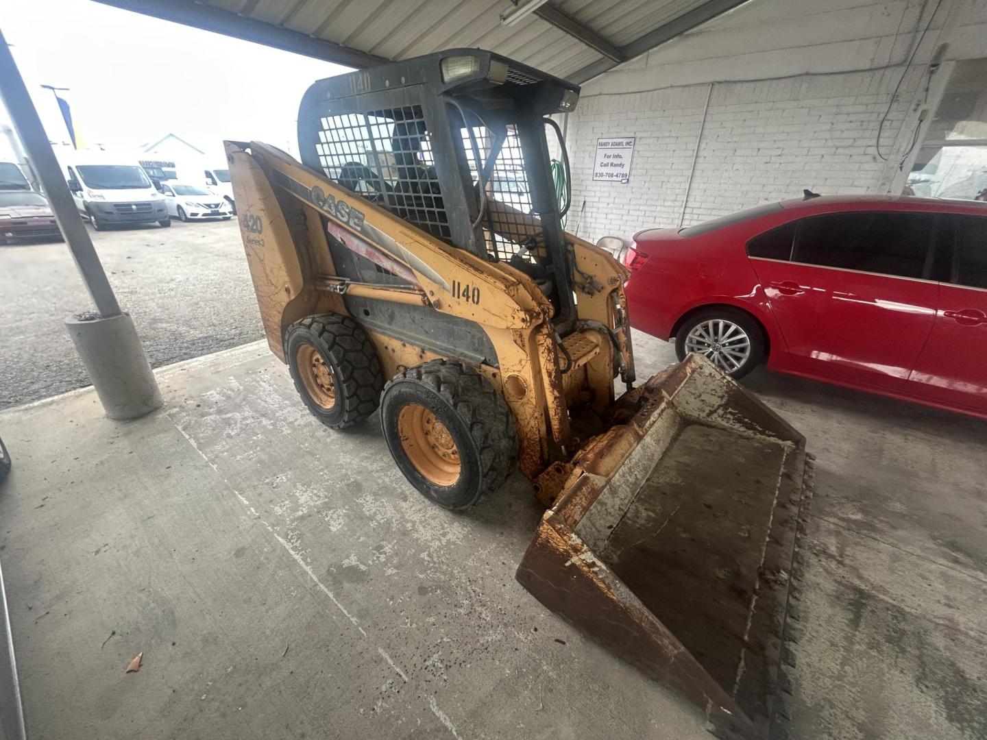 2009 Yellow Case 420 series 3 (NAM413641) , located at 1687 Business 35 S, New Braunfels, TX, 78130, (830) 625-7159, 29.655487, -98.051491 - Photo#2