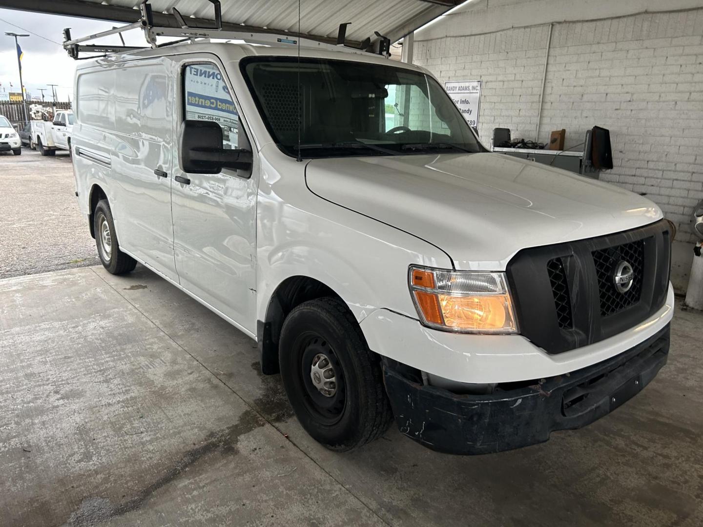 2017 White Nissan NV Cargo (1N6BF0KM1HN) with an 4.0L V6 F DOHC 24V engine, AUTOMATIC transmission, located at 1687 Business 35 S, New Braunfels, TX, 78130, (830) 625-7159, 29.655487, -98.051491 - Photo#3